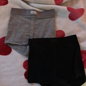 black and gray paired boxers